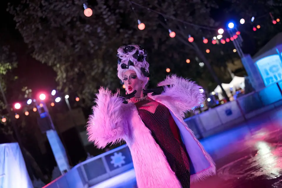 A skater in pink fur at Pop Diva Night